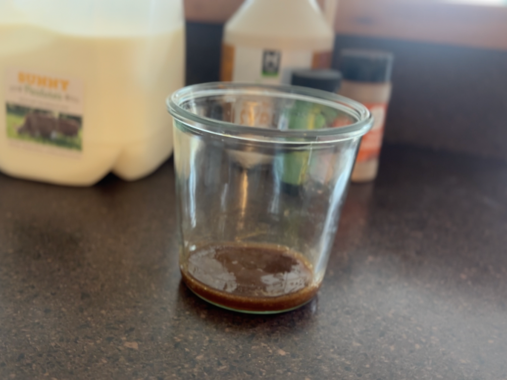 maple syrup, vanilla bean paste, and cinnamon in a glass