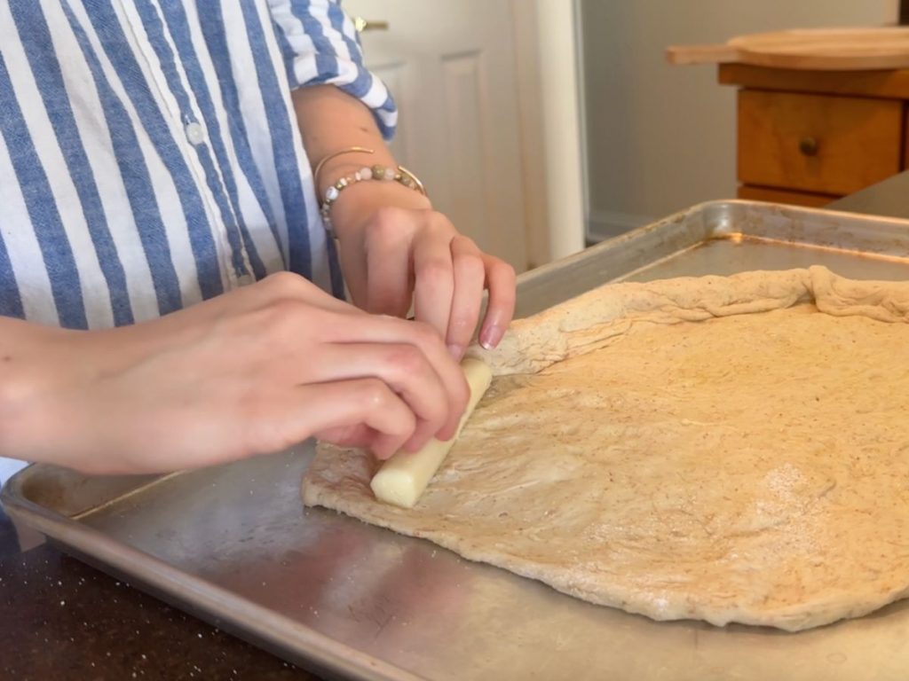 folding pizza crust over cheese stick